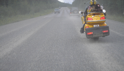 motorcycle riding on gravel