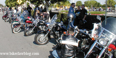 Motorcycles and Bikers Lined Up on at a Run