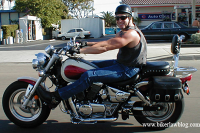 California Biker and Motorcycle Accident Lawyer Norman Gregory Fernandez riding one of his motorcycles on Pacific Coast Highway in Malibu, California.