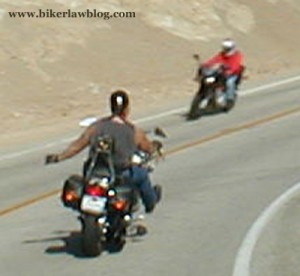 California Biker Lawyer Norman Gregory Fernandez riding around a curve on Mulholland Highway