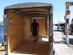 The inside of my cargo trailer at the shop, before customization