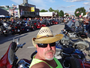 California Motorcycle Accident Attorney Norman Gregory Fernandez at the Sturgis Motorcycle Rally on the main drag, August 3, 2013