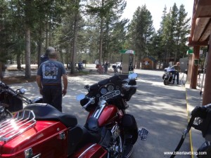 My Harley Electra Glide in Yellowstone at gas station