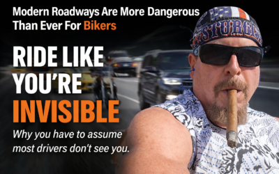 Motorcyclist riding on highway with traffic showing dangers of modern cars SUVs and aggressive drivers – ride like you are invisible safety concept